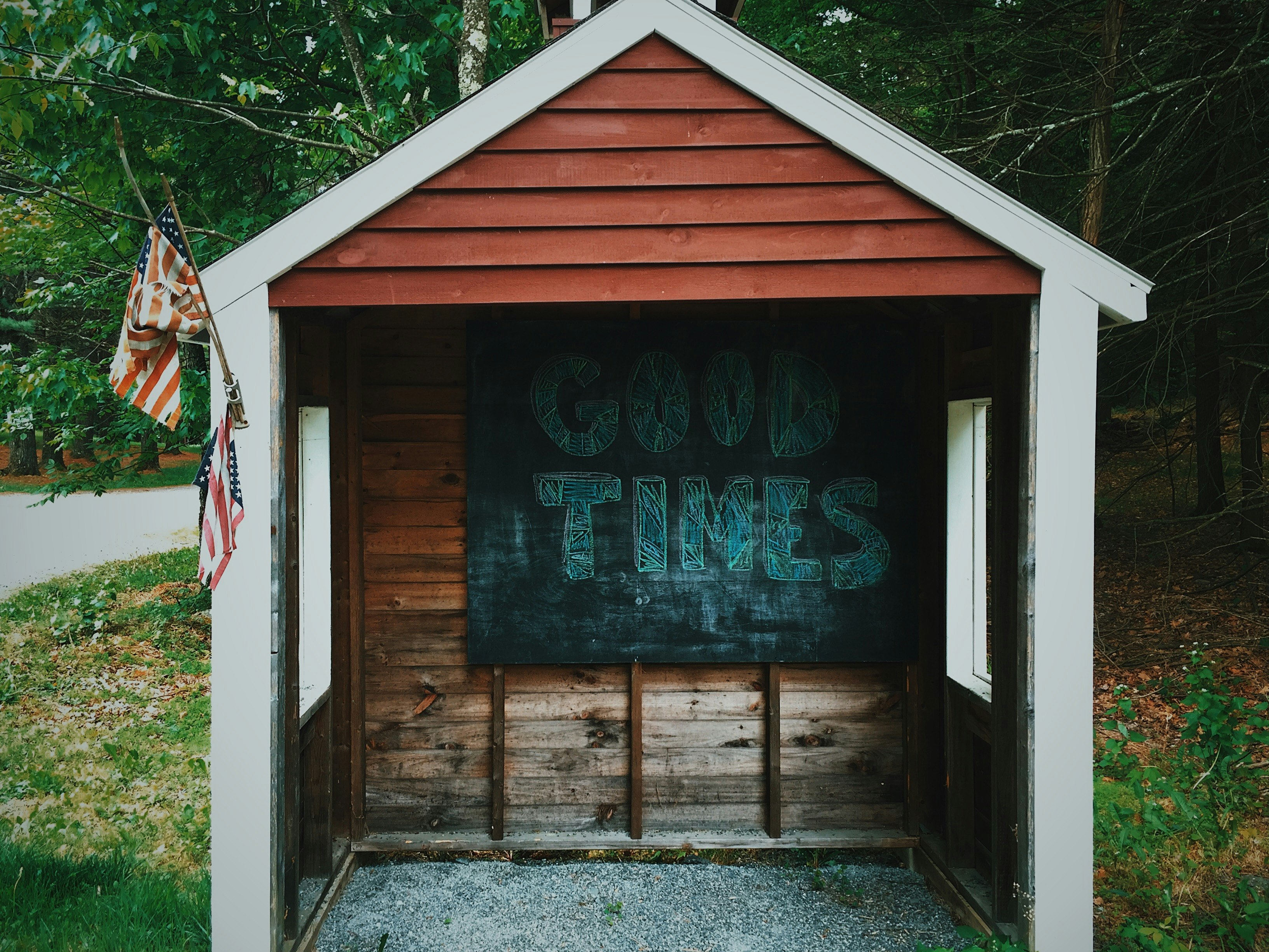 brown and white wooden shed